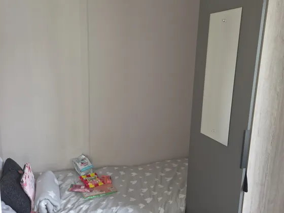 Twin bedroom suitable for children or extra guests.